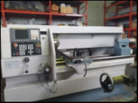 Tornio CNC  720/1500 usato TORNIO CNC A 2 ASSI DAEWOO PUMA 500  foto 10